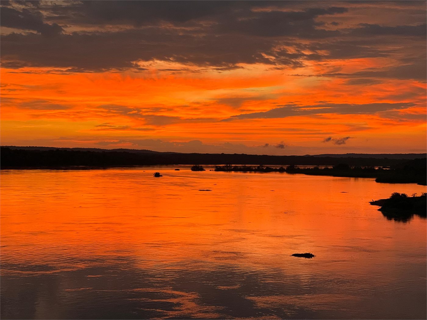 Warm sunset farewell at the end of a Uganda honeymoon safari